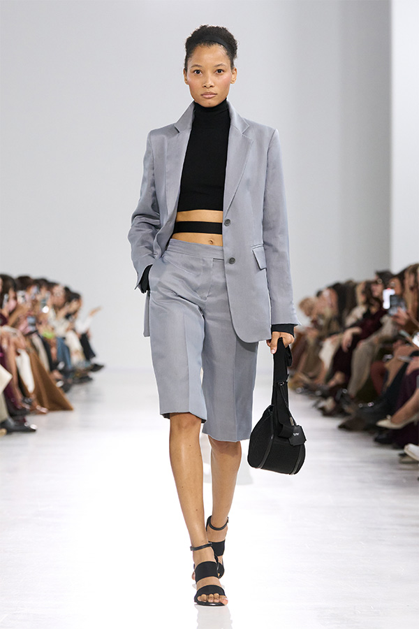 Max Mara Spring/Summer 2026 Fashion Show - Look with Blazer and matching Bermuda shorts and black bag.